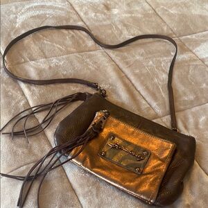 Elegant Gold and Brown Crossbody Bag with Intricate Design